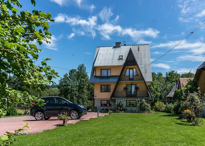 Sloneczny Dworek Pensión *