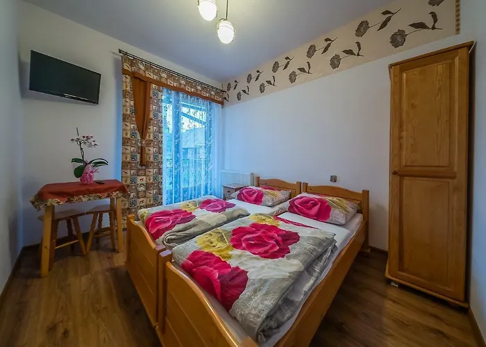 Sloneczny Dworek Pensión *